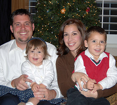 Family in front of the Christmas Tree